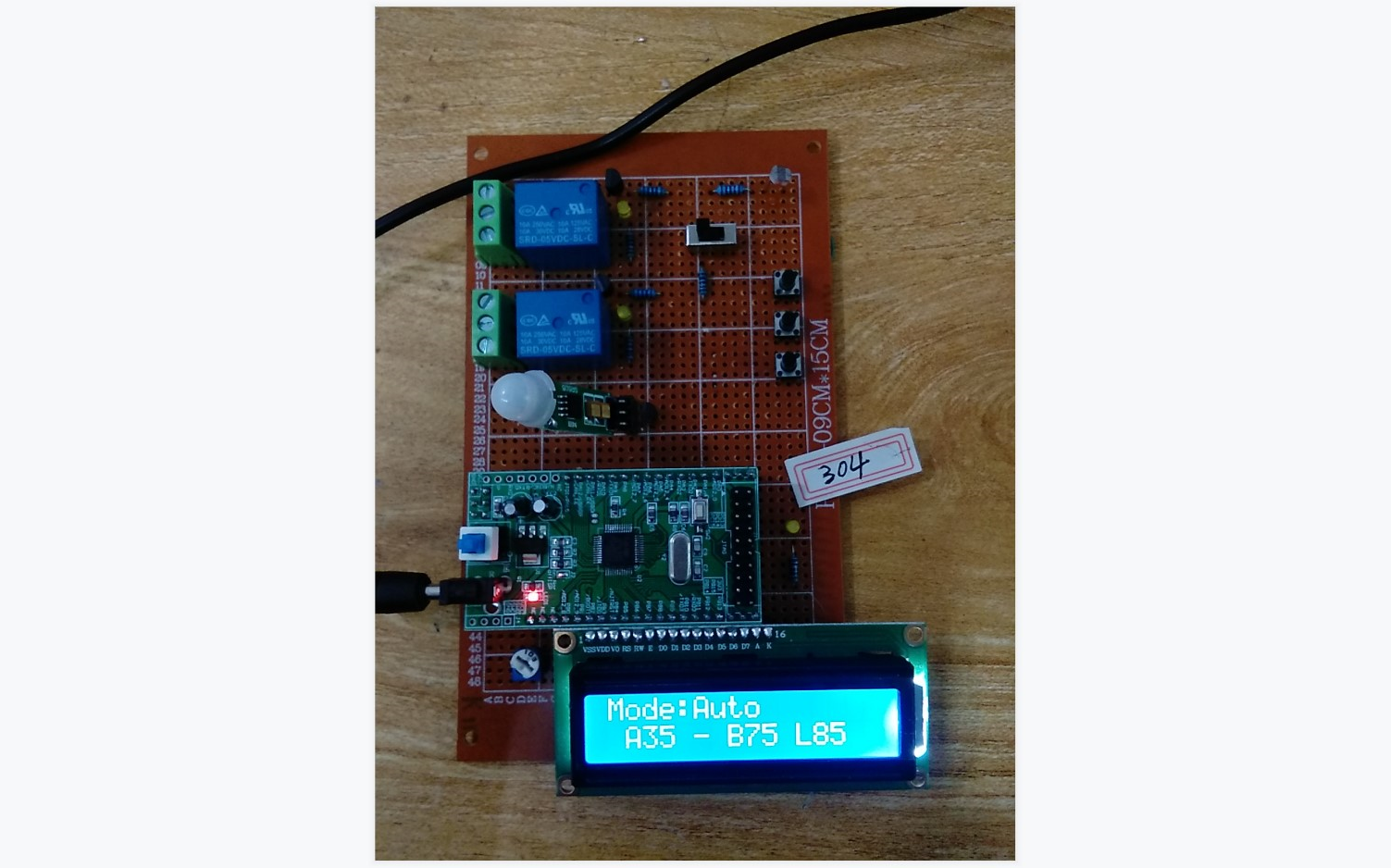 [图]基于STM32单片机的图书馆智能节能灯照明灯系统设计-LCD1602-热释-光敏-拨动-KEY-RELAY-DIY开发板套件21-304