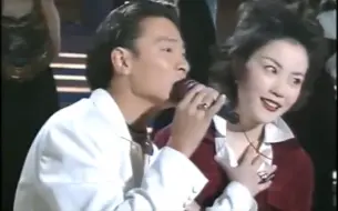 Download Video: 【王菲 刘德华】容易受傷的女人 刘德华演唱 王菲伴舞 1993