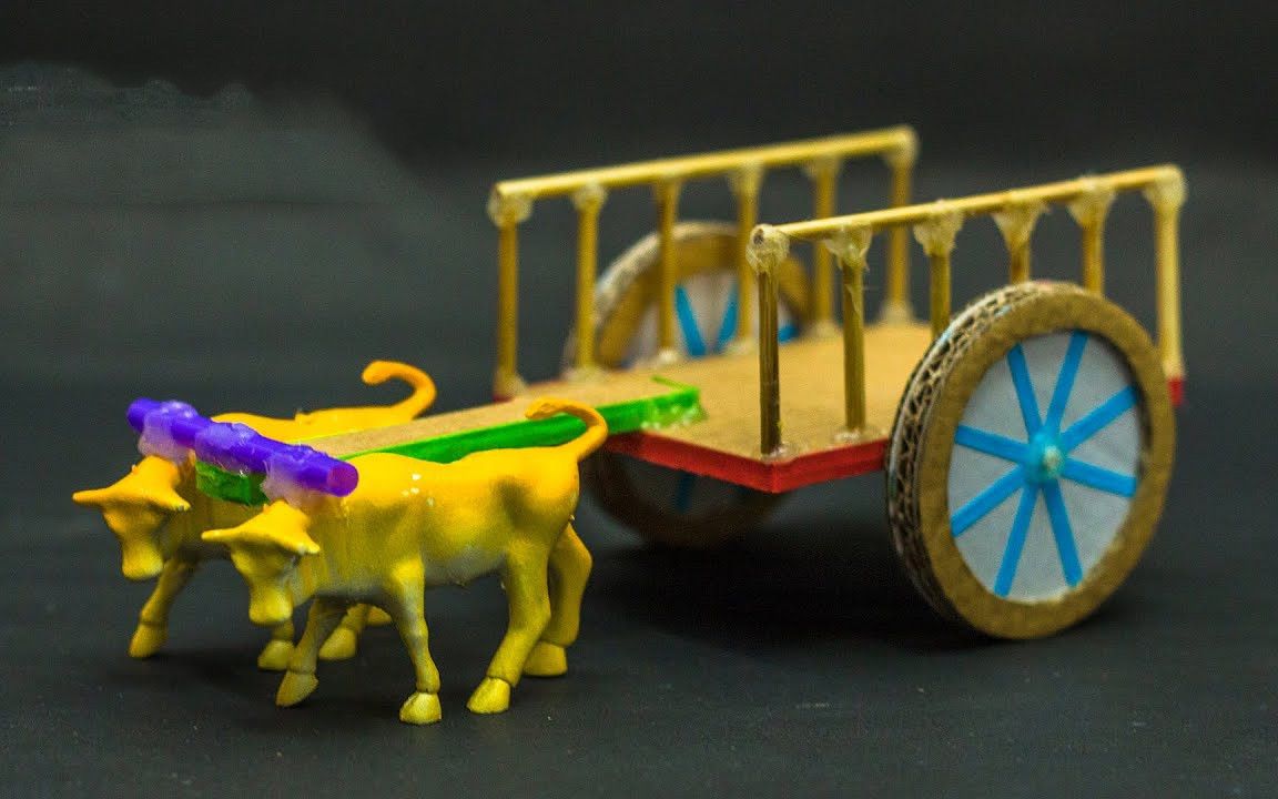 用硬纸板制作一个老牛拉车玩具模型