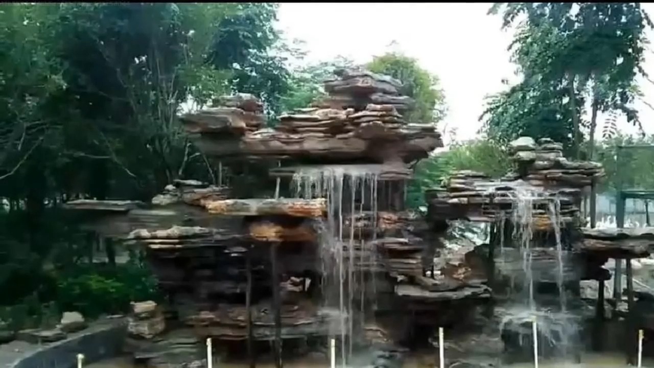 中国园林建筑艺术中的魅力雕塑——塑石假山流水墙
