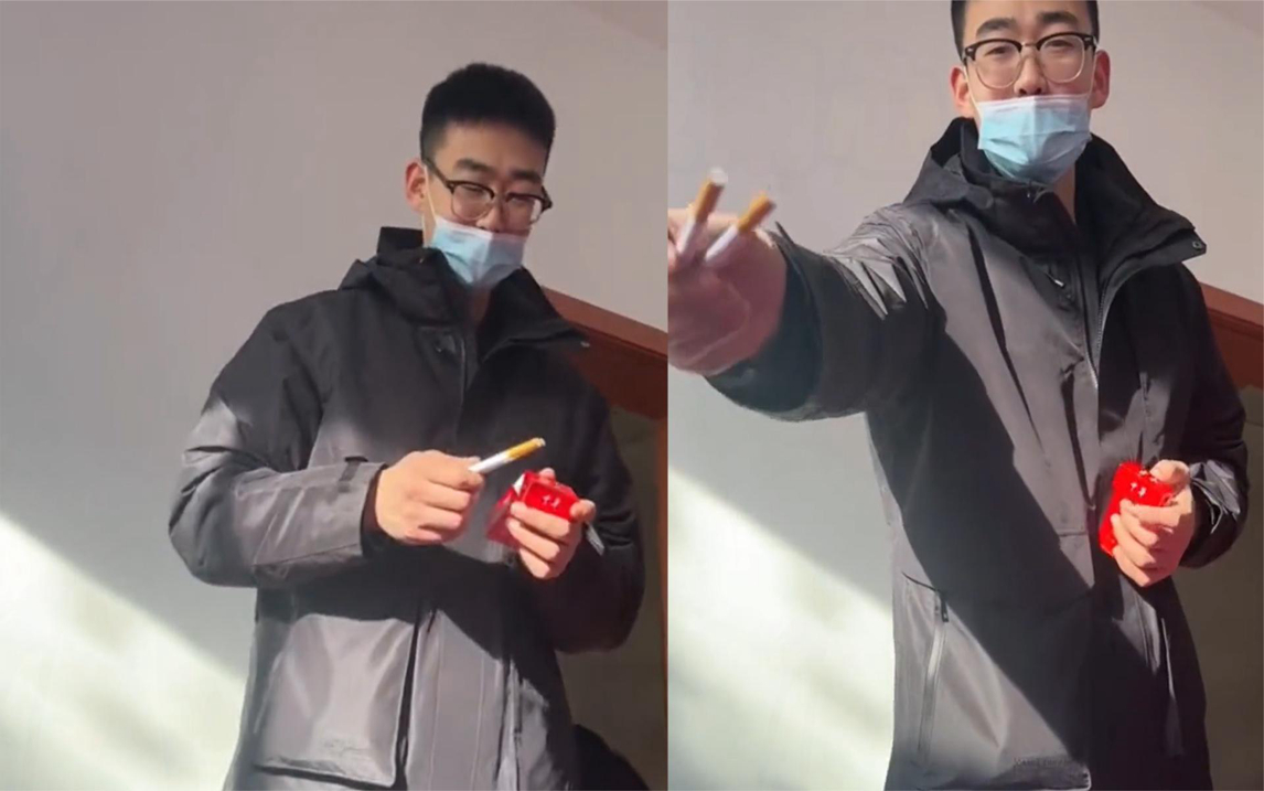 男生不抽烟不知如何给亲戚散烟,拿烟问女友怎样散烟,模样太可爱