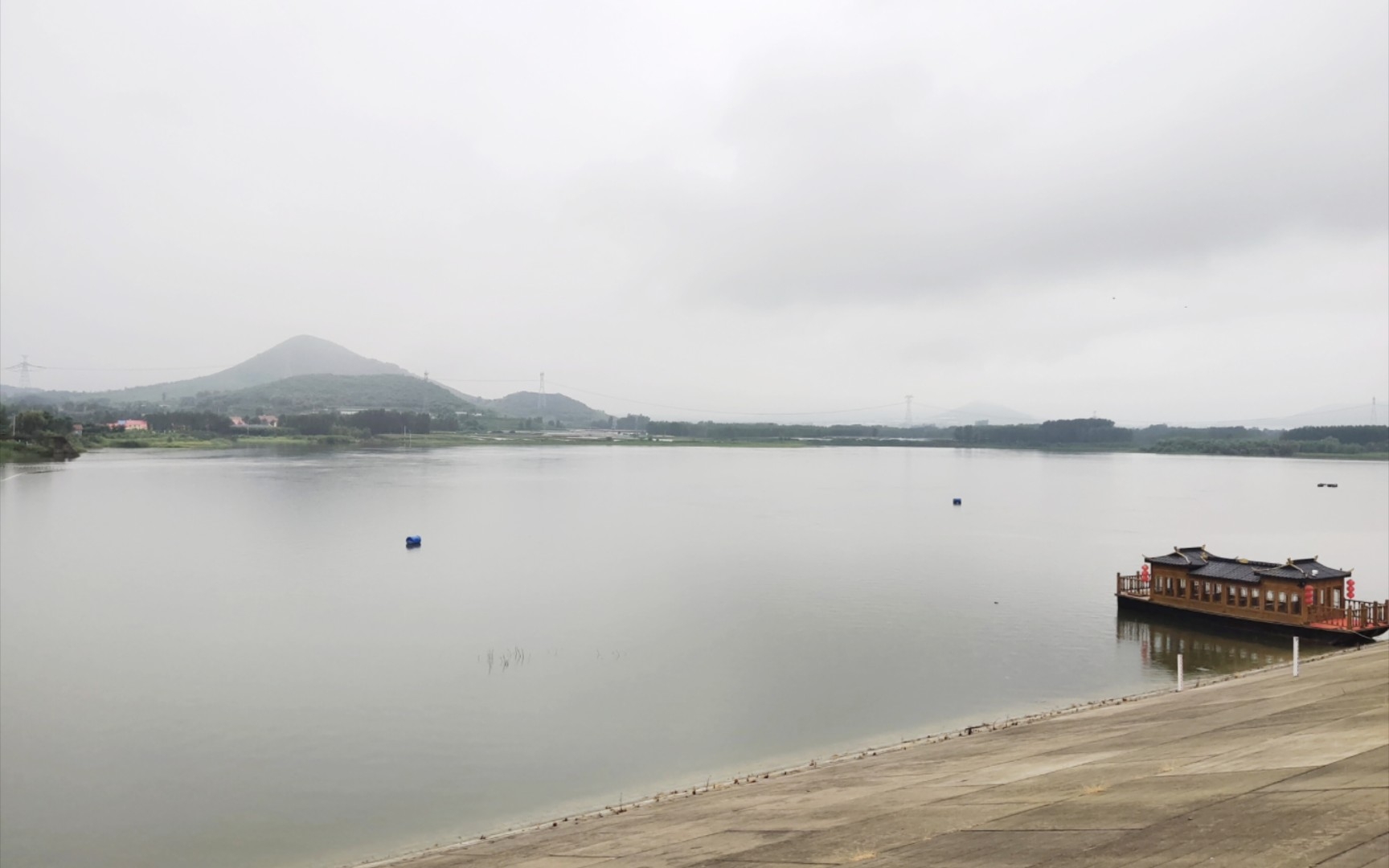 [图]又是一个下雨天，五菱mini遮风挡雨，上班路上风雨无阻！