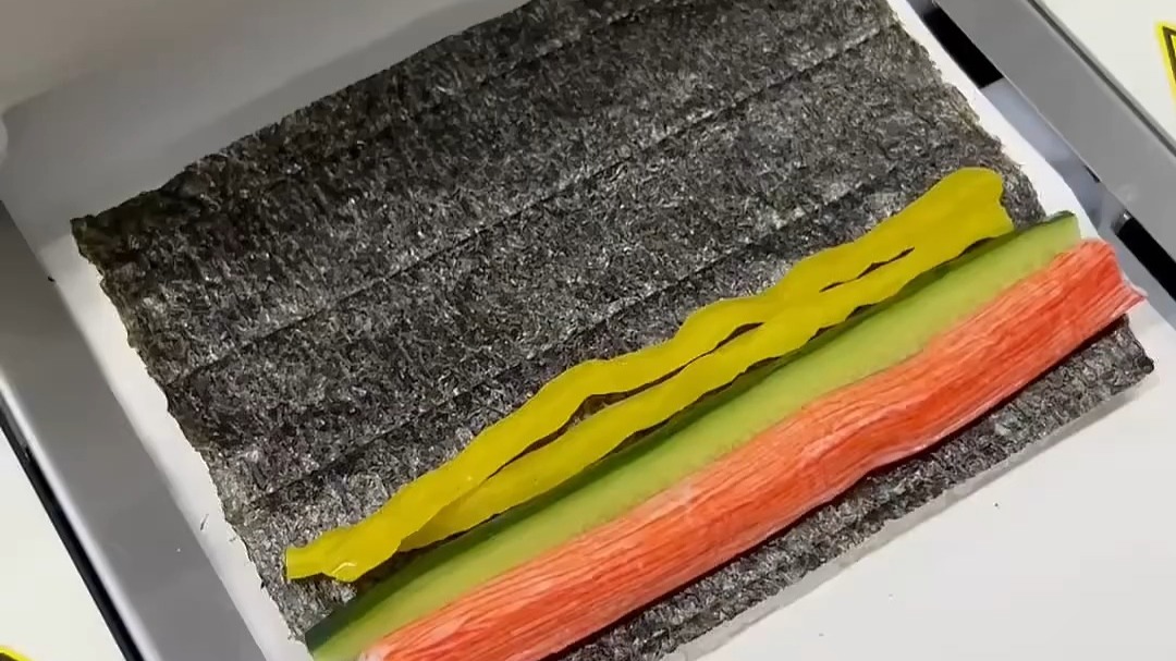 这是什么自动寿司机吗?