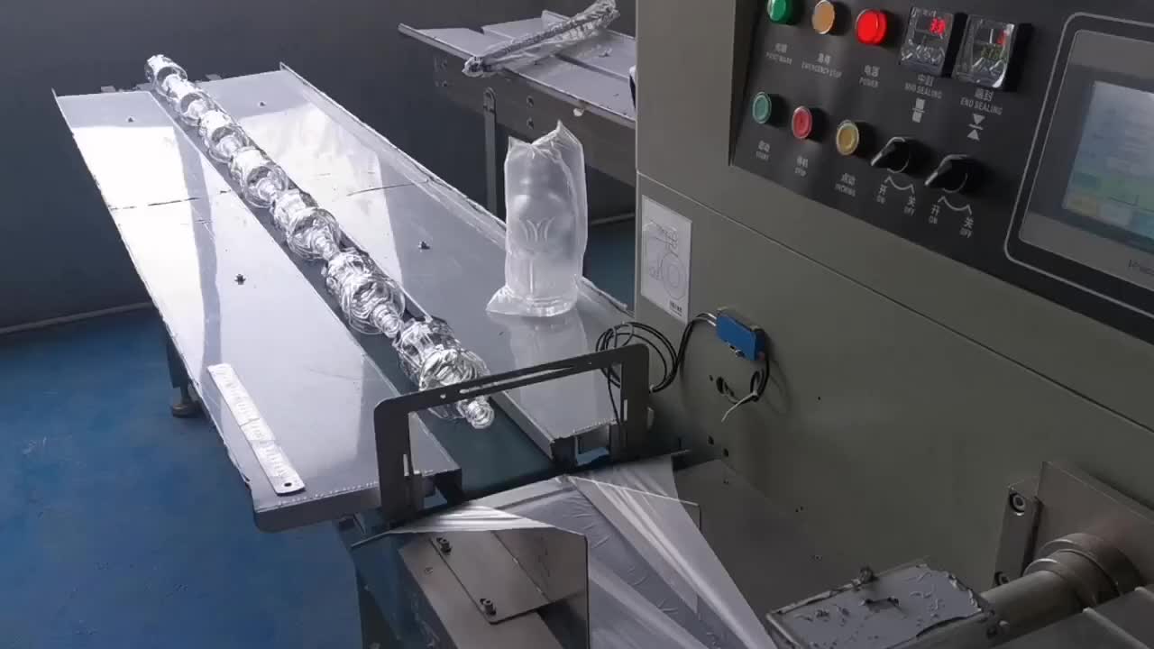 酒瓶包装机反向操作白晶瓶打包机玻璃瓶套袋机