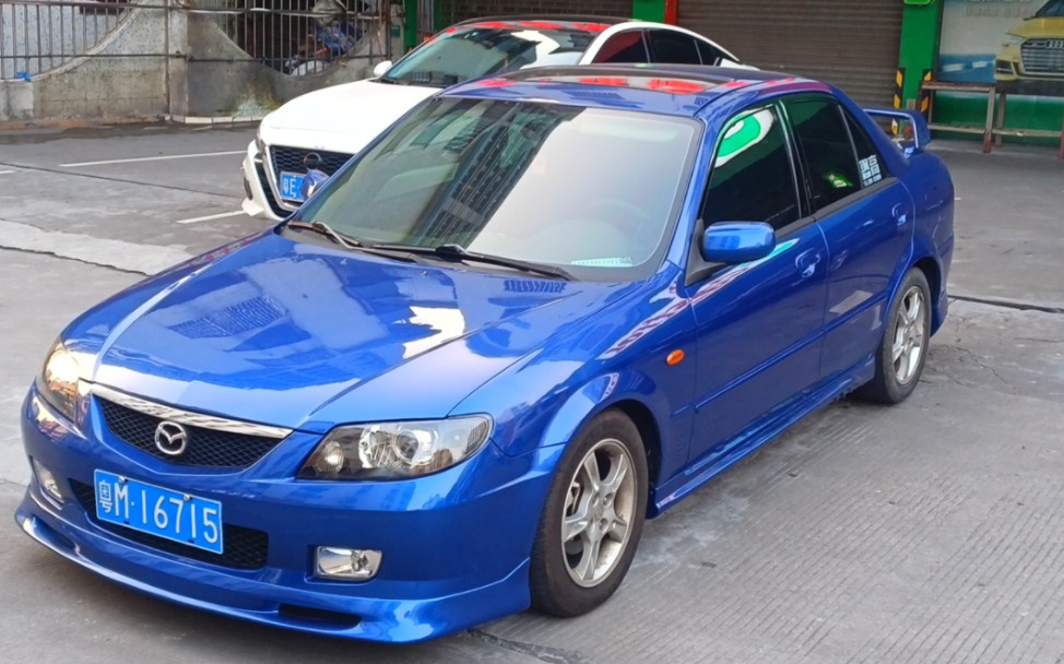 马自达323加装自动大灯