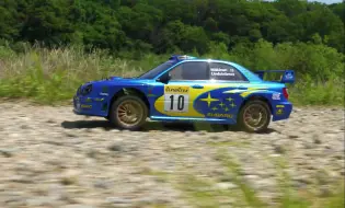 Video herunterladen: 原装就有这么好的姿态！京商拉力 FAZER Mk2 SUBARU IMPREZA WRC 2002动态拉力视频