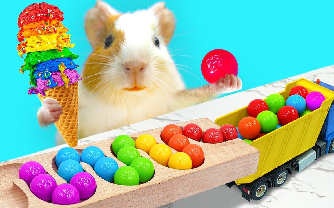 仓鼠玩游戏吃彩虹冰激凌,感觉很快乐