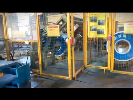 钢卷打捆机-钢卷穿孔打捆实拍