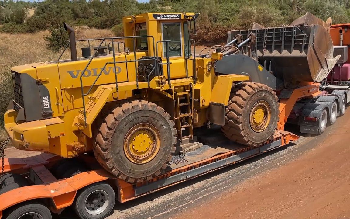 【大件运输】曼恩tga运输沃尔沃l330e轮式装载机