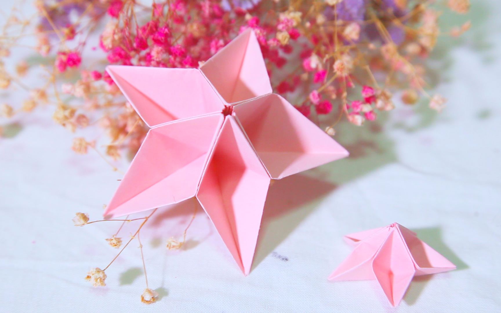 手工纸艺只需简单折叠几下就可做出漂亮的五星花