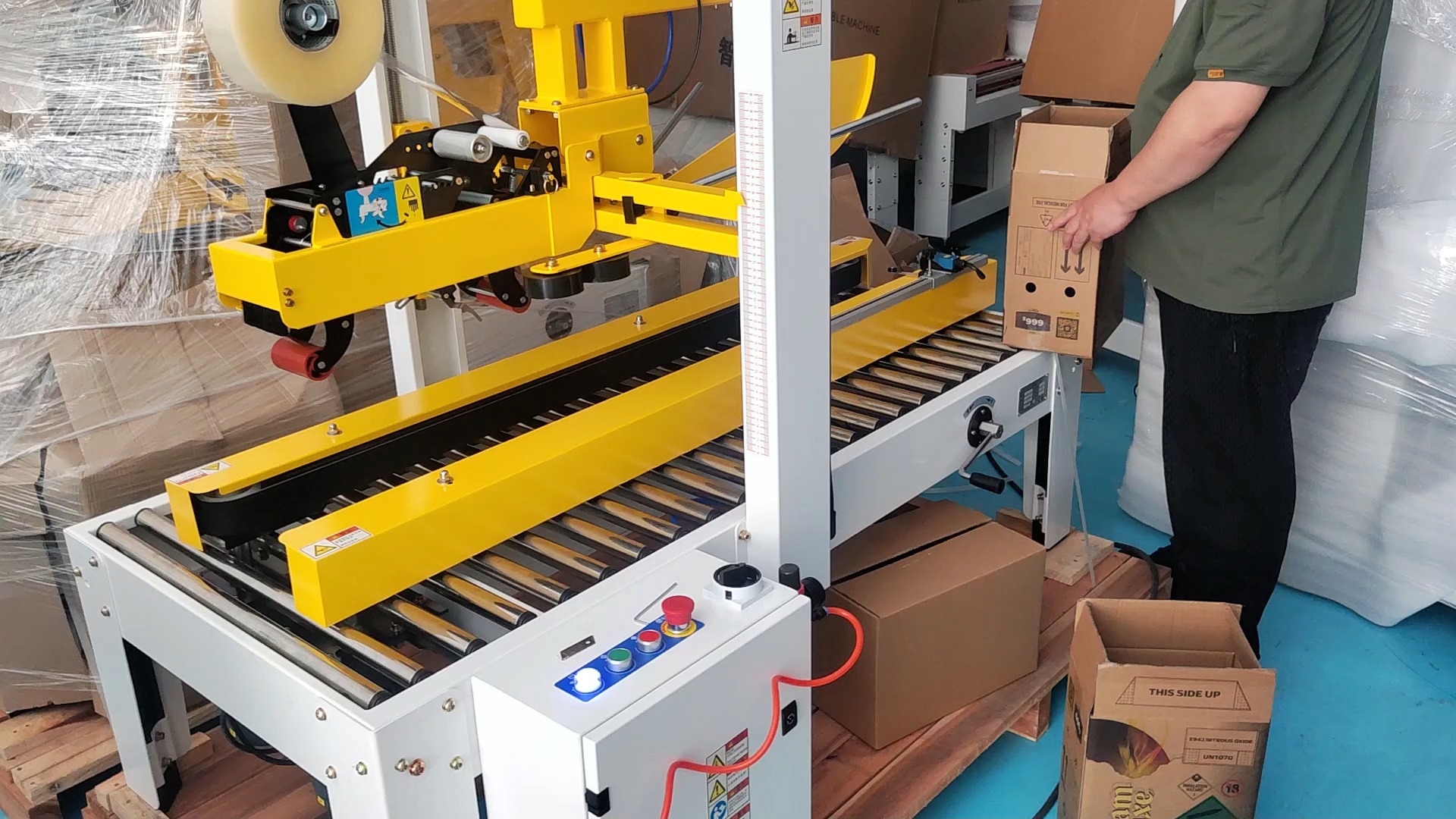 封箱机的工作原理及技术特点