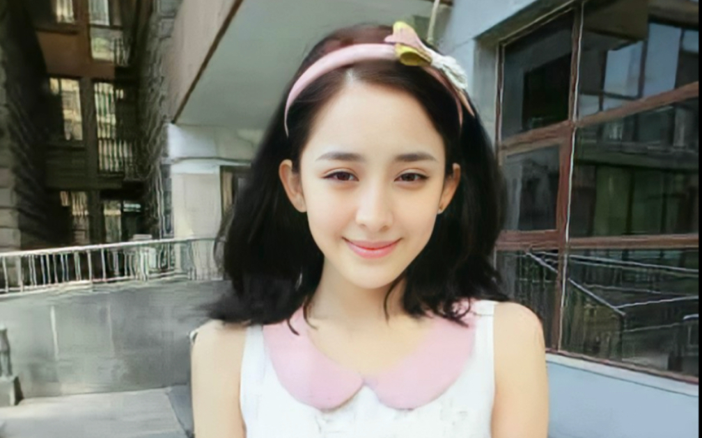 看了娜扎从小到大的成长照只能说不愧是纸媒时代靠纯素颜照就能迅速