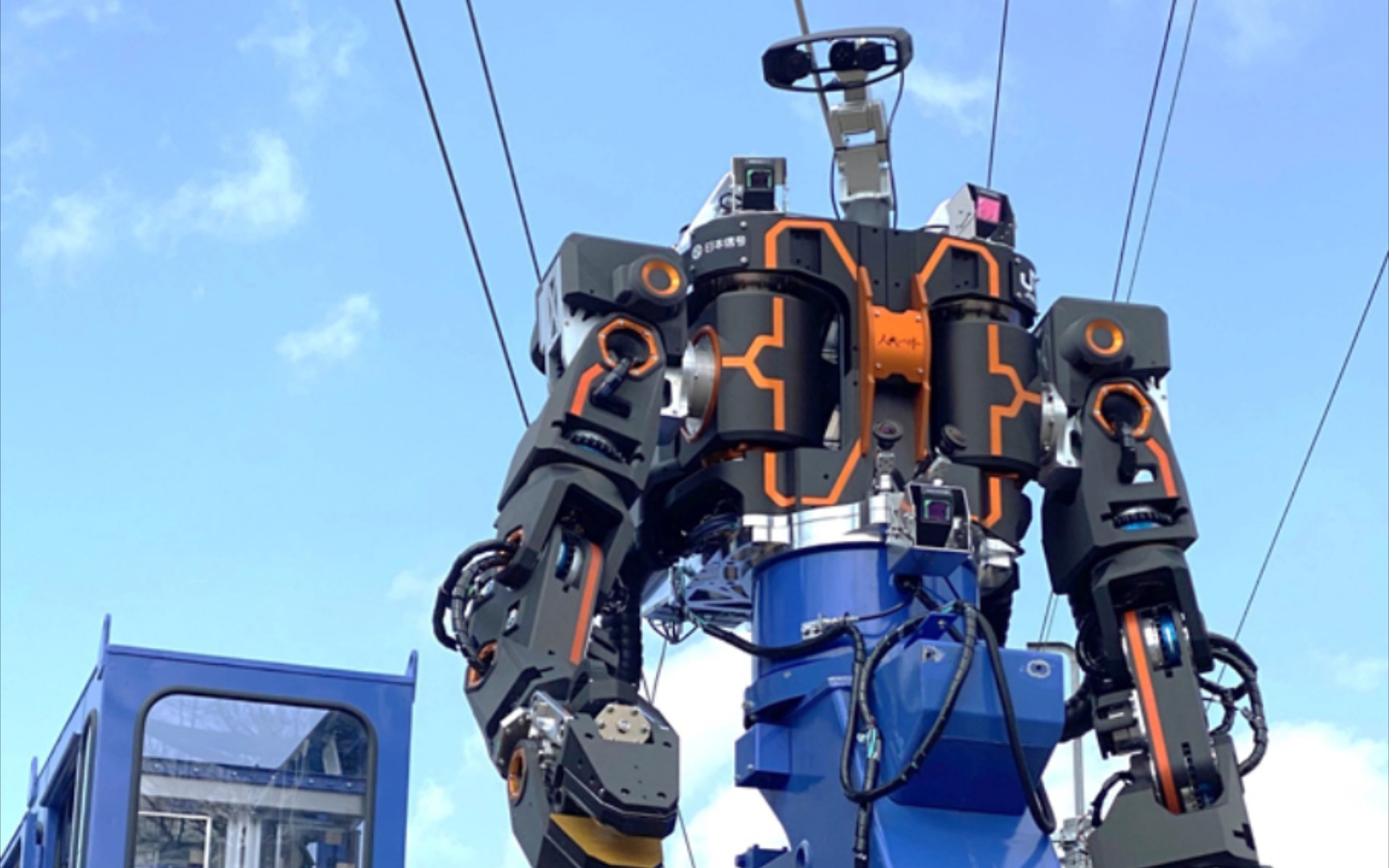 jr西日本开发人形重型机械机器人与工程用车融合的铁路重型机械