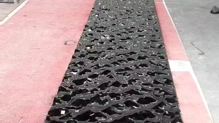 黑金沙进口石材来自印度的荒料,水波纹异形加工,效果不错!