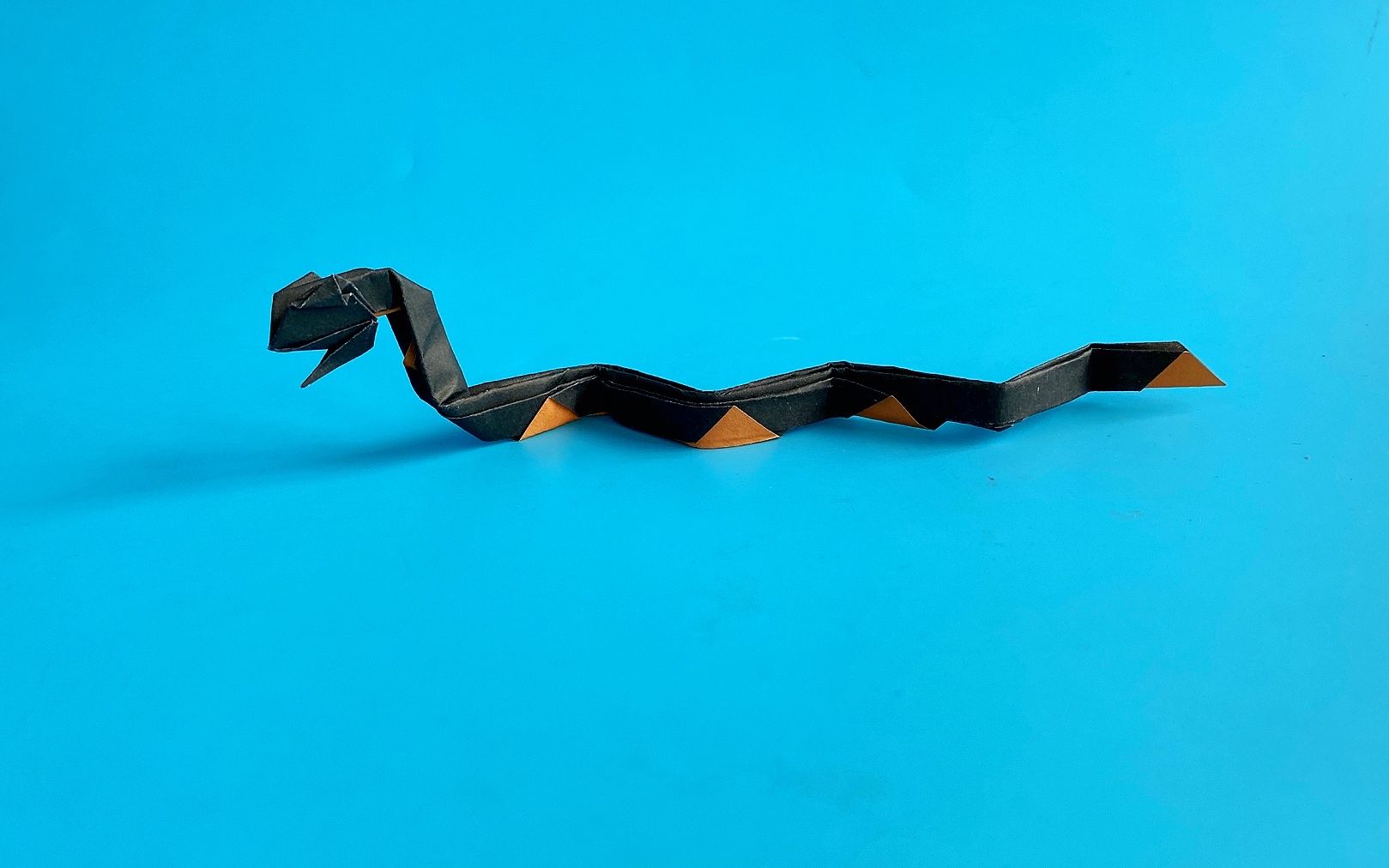 用纸折一条蛇图片
