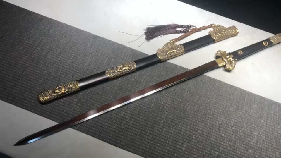 花纹钢发红黑檀木铜装诸刃唐剑