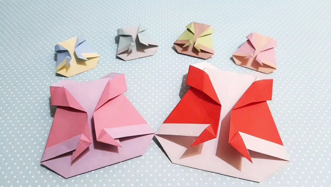 今天我们来制作圣诞节折纸斗篷!