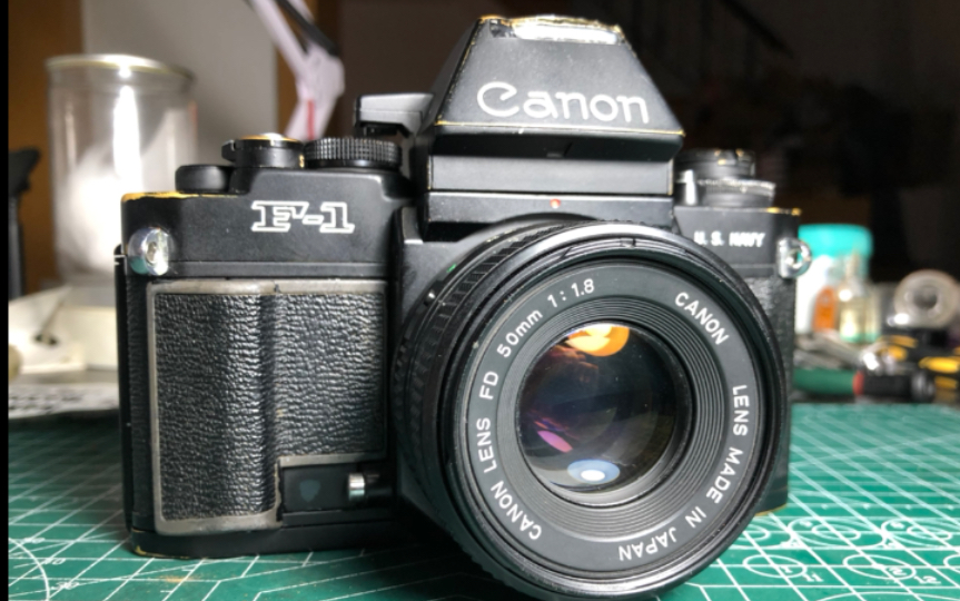 年纪大了~多数都会老花眼的~~一台测光差挺多的newf1佳能胶片单反