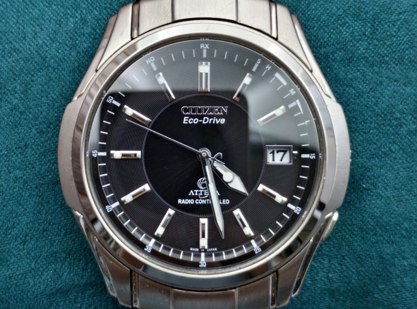 西铁城海螺钛合金光动能电波男表