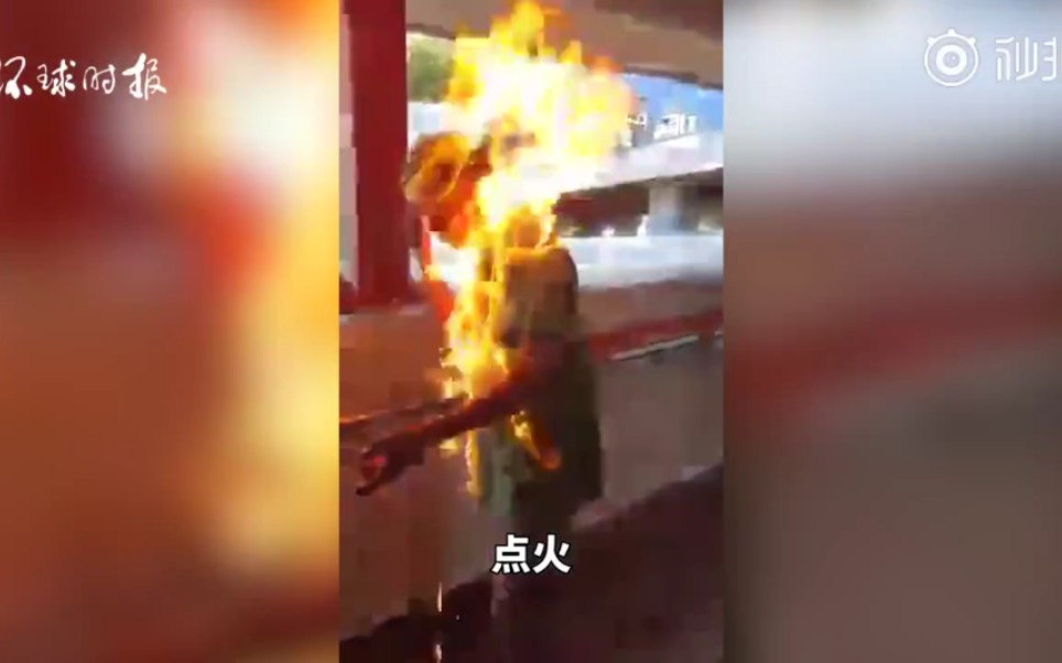 [图]一香港市民与暴徒对质时被烧成火人